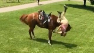 Woman Falls Off Bucking Horse [upl. by Cad]