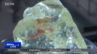 Proceeds from the Peace Diamond sale go towards rebuilding Sierra Leone [upl. by Noxas]